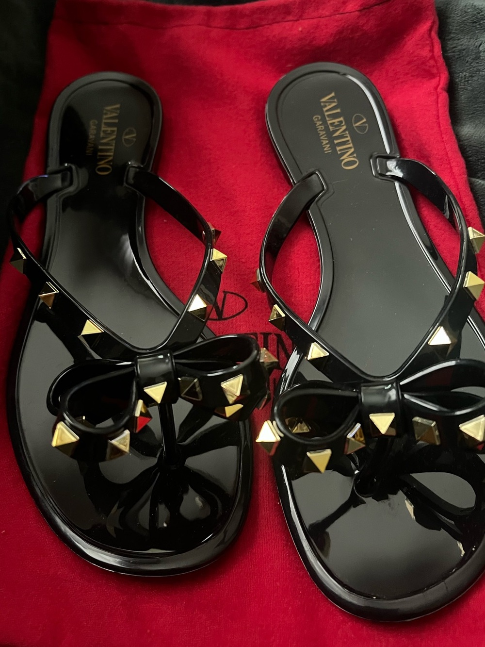 Valentino Garavani Black Jelly Bow Slide Sandals with Gold Studs